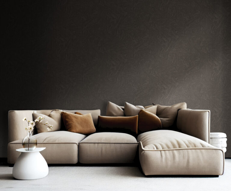 light brown sofa with beige carpet in apartment on grey wall background